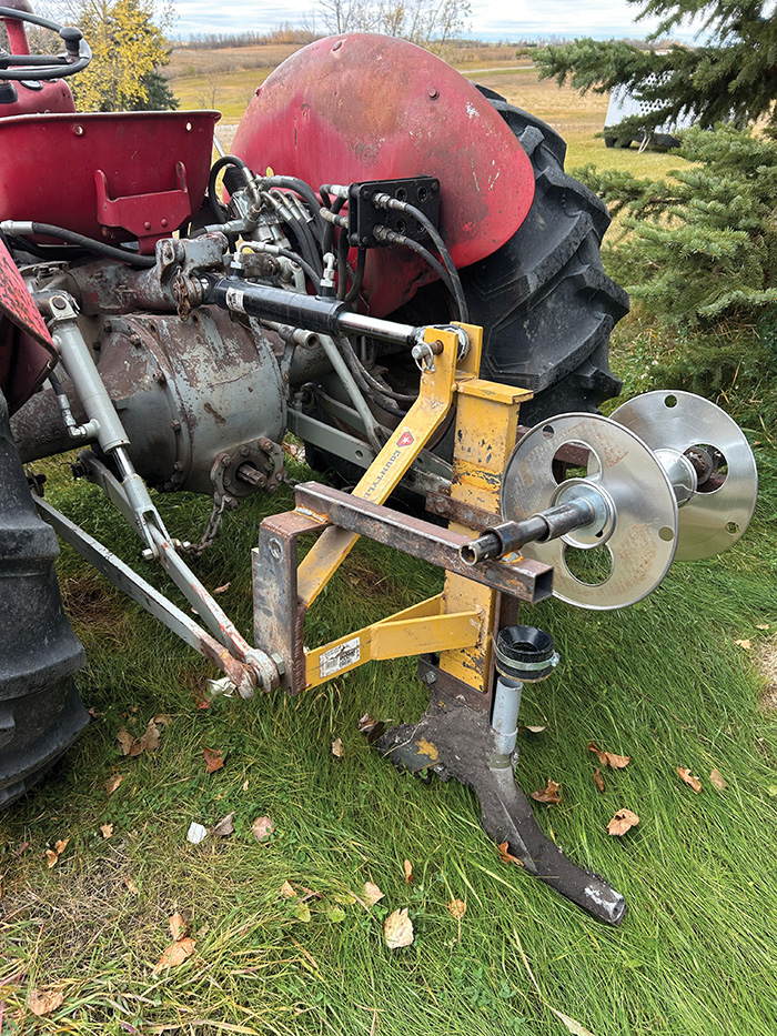 A homemade cable plow to pull the wire.<br />
